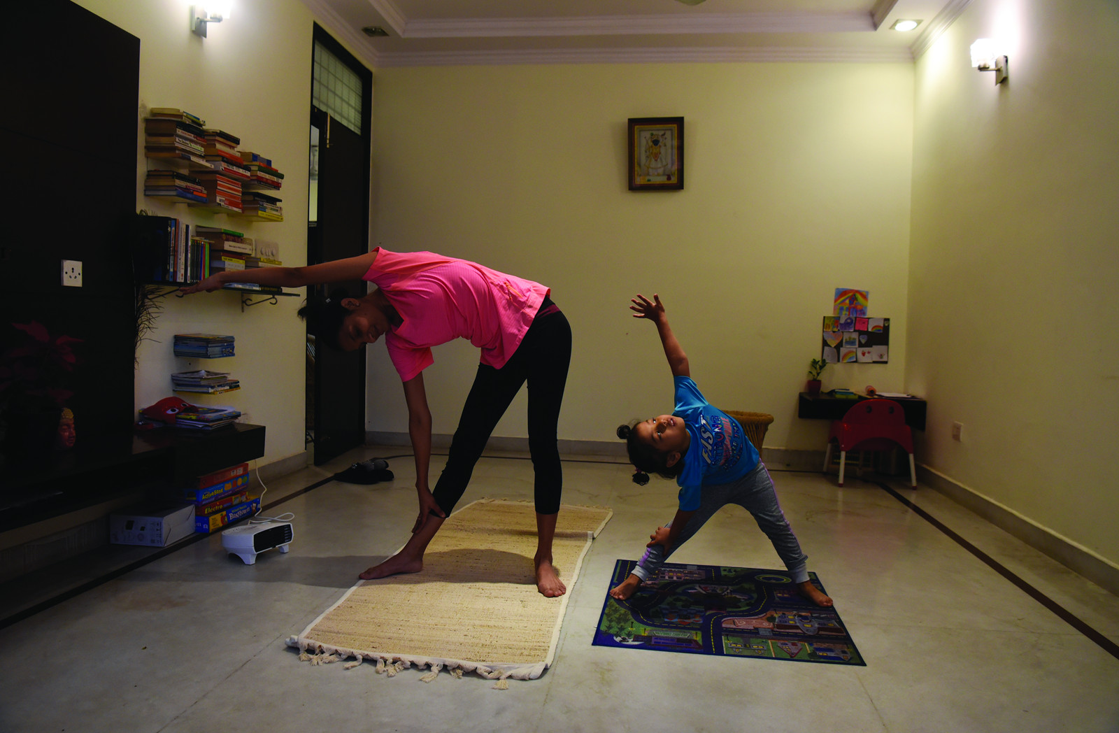 Starting the day out right: yoga with daughter Sabi