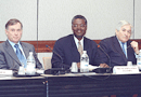 From left to right: IMF Managing Director Horst K&ouml;hler,
Warren Nyamugasira, Uganda National NGO Forum and World Bank President
Jim Wolfensohn