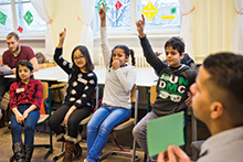 Pupils from different countries attend a German language class for immigrant children in Berlin, Germany.