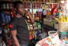 Store owner in Accra, Ghana where, despite highly rated business climate, firms lack affordable credit, reliable power (photo: Chris Stein/AFP/Newscom) 