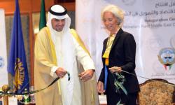 IMF Chief Christine Lagarde joins Kuwait’s Minister of Finance Anas Al-Saleh in cutting the ribbon that symbolized the official inauguration of the IMF Middle East training center in Kuwait City (photo: IMF) 