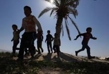 Syrian children play near Amman: The Syrian refugee crisis was one of several recent shocks to Jordan’s economy (photo: Muhammad Hamed/Reuters/<br>Newscom) 