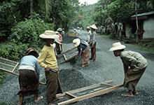 Women building a road in Jakarta: Sustaining strong growth will require the government to invest in infrastructure (photo: Nik Wheeler/Corbis) 