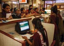 Women line up for various applications at the SEWA Cooperative Bank for Women.