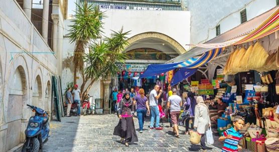 Tunis, Tunisia: Many different stalls with local goods next to the walls of the Great Mosque. (photo: efesenko/iStock)
