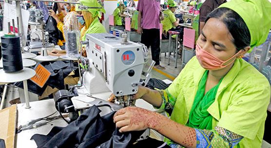 A worker in a garment factory in Dhaka, Bangladesh. Many workers in the garment industry lost their jobs in recent months; the sector was heavily affected by crisis-related factors. (Xinhua News Agency/Newscom)