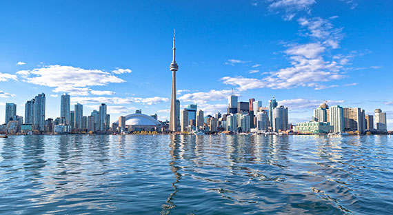 Skyline of Toronto City, Ontario. Under the federal backstop system, most households in Ontario will receive more in tax rebates than they incur in costs resulting from pollution pricing. (photo: espiegle by Getty Images)