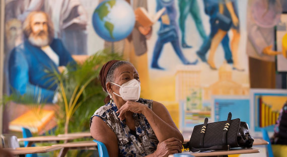 A woman waits her turn to receive a COVID-19 vaccine at a medical center in Santo Domingo, Dominican Republic. The country’s vaccine rollout has been relatively rapid (photo: Orlando/Barria/EFE/Newscom)