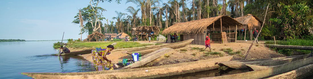 Woman washing clothes in the Congo River