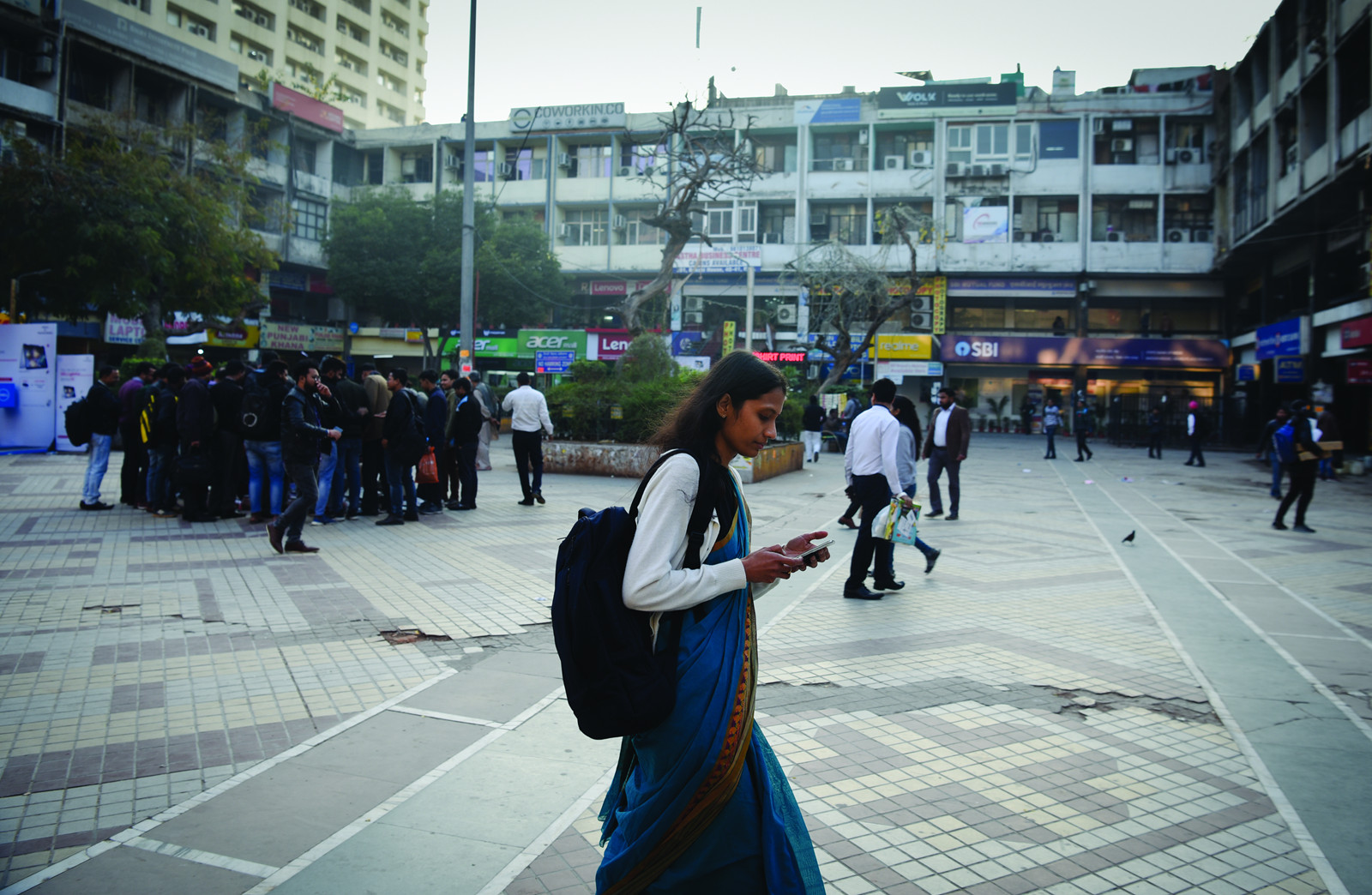 Walking past Nehru Place market