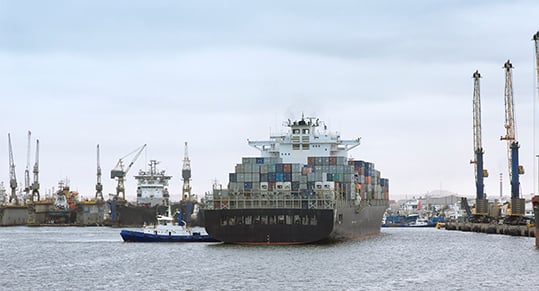 Commercial container ship reaching the port of Walvis Bay, Namibia.  Lower commodity prices and other factors could lower growth in sub-Saharan Africa (iStock/dani3315) 