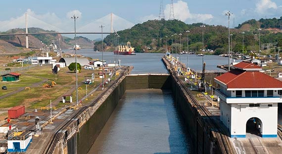 The Panama Canal with the Centennial Bridge in the background. The pandemic has taken a toll on trade in Central America. (photo: Lokibaho by Getty Images)