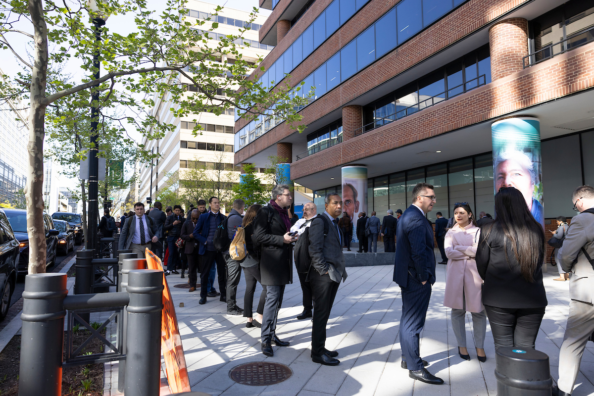 IMF meetings participants waiting in line