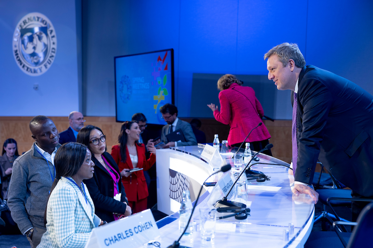 Financial Counsellor, Tobias Adrian answers questions of the audience after the Press conference