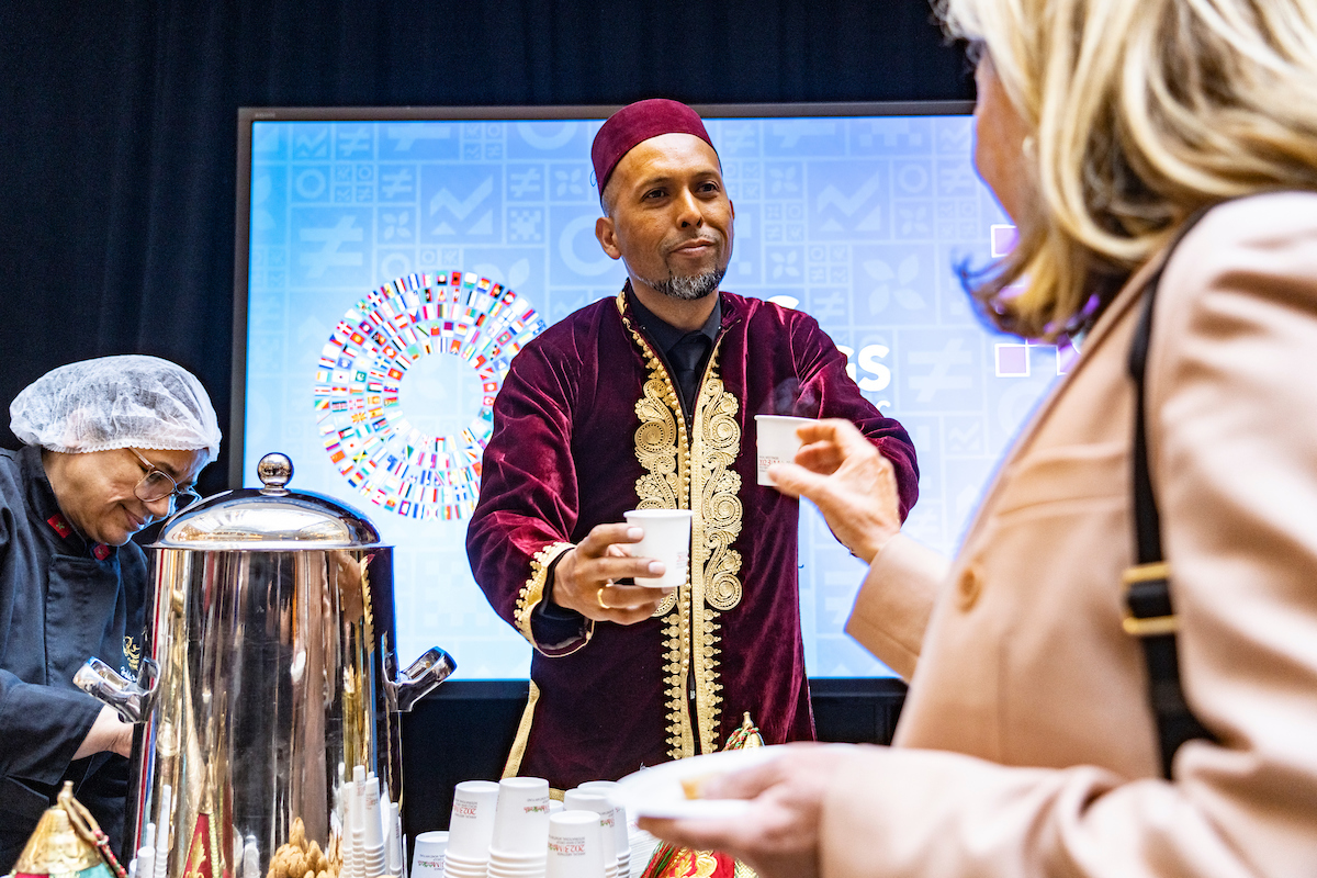 A participant enjoys a cup of tea at the Moroccan Tea Ceremony during the 2023 Spring Meetings.