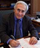 IMF Managing Director Dominique Strauss-Kahn signs a note purchase agreement with the People's Bank of China at IMF Headquarters.
