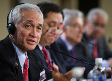 The Intergovernmental Group of Twenty-Four on International Monetary Affairs and Development (G-24) Chairman Margarito Teves (L), Jeremias Paul (2nd L), Ariel Buira (2nd R) and Francisco Baker (R) hold a press conference at the Suntec Convention Center in Singapore
