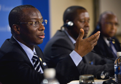 African Finance Ministers Abdoulaye Diop (L), Minister of Economy, Finance, and Planning for Senegal, Amos Kimonya (C), Minister of Finance from Kenya, and John Benjamin (R), Minister of Finance from Sierra Leone hold a press conference at the Suntec Convention Center in Singapore