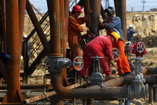 Caucasus, Central Asia Feel Crisis Impact, But Set for Modest Upturn