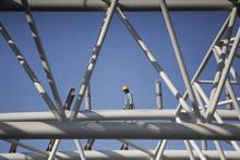 Laborers in Naypyitaw, Myanmar—where recent growth has been fueled, in part, by construction, gas production, services (photo: Reuters/Corbis) 