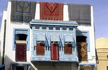 Tunisian carpet shop. Structural reforms needed to kick-start growth, create jobs in Mideast (photo: Terry Harris/Stock Connection USA /Newscom) 