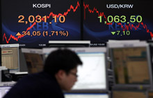 A trader at a bank in Seoul, Korea: the IMF plans to evaluate 16 countries&rsquo; financial sectors in 2013, including Korea (photo: Jeon Heon-Kyun/EPA/Newscom) 