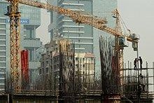 Construction site in Mumbai. Subsidy reduction measures, other spending cuts, and tax administrative measures in India will help keep the projected 2013 deficit almost unchanged from 2012 (photo: Punit Paranjpe/Newscom) 
