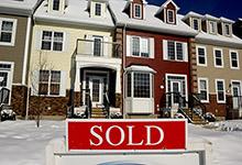 New town houses in Alberta, Canada. IMF says Canada needs to rebalance growth from household consumption and residential construction toward exports and business investment (photo: Robert McGouey/Corbis) 