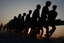 Bridge builders in Allahabad, India: IMF work agenda will study how structural reforms such as more infrastructure investment will spur growth (photo: Prabhat Kumar Verma/Sipa USA) 