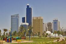 Abu Dhabi skyline: Given the new realities of the global oil market, the region’s oil-exporters should move to diversify their economies, IMF says (photo: Newscom) 