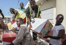 Protective, training gear to combat Ebola arrives in Monrovia, Liberia, where Ebola epidemic has had devastating effect (photo: Ahmed Jallanzo/epa/Corbis) 