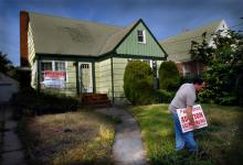 A home for auction: securitized assets, like mortgage-backed securities, create risks and benefits to financial stability (photo: Neville Elder/Corbis) 