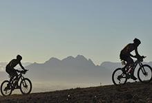 Participants in the Absa Cape Epic mountain bike race, Cape Town, South Africa; growth in the region is an uphill battle (photo: Ralph Hirschberger/dpa/Corbis) 