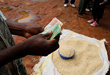 Street trader selling maize in Malawi: some countries have very few taxpayers in the system, says Postel (photo: Mike Hutchings/Reuters/Newscom) 
