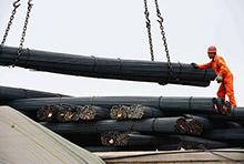 Fábrica siderúrgica en Qingdao, China. El crecimiento inferior a lo previsto en los mercados emergentes está empañando las perspectivas mundiales (foto: STR/AFP/Getty Images/Newscom) 