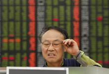 Un investisseur &agrave; S&eacute;oul : m&ecirc;me un investissement simple comme un fonds commun de placement peut pr&eacute;senter des risques pour la stabilit&eacute; financi&egrave;re (photo: Reuters/Jo Yong-Hak) 