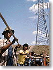 Photo for Mody-Walton Article (Workers
and Electrical Tower)