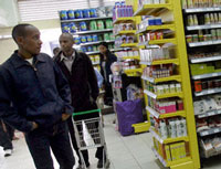 People shop in a supermarket in downtown Nairobi, Kenya.
