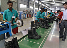 Workers on assembly line at Huajian shoe factory in Dukem, Ethiopia.