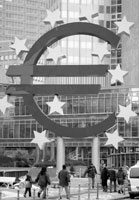 Euro symbol sculpture marks launch of new
currency in Germany.