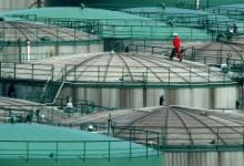Нефтехранилища в Гамбурге, Германия. В Бюллетене ПРМЭ показано, что снижение цен на нефть в целом является положительным для мирового роста, но этого недостаточно для компенсации слабой инвестиционной активности (фото: Christian Charisius/Reuters/Corbis). 