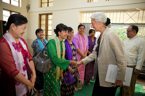 International Monetary Fund Managing Director Christine Lagarde is greeted by faculty members prior to speaking at the Yangon Institute of Economics at Yangon University December 7, 2013 in Yangon, Myanmar. Lagarde is on her final leg of a three country visit to Asia. IMF Photograph/Stephen Jaffe