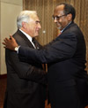 International Monetary Fund Managing Director Dominique Strauss-Kahn greets Ambassador Roble Olhaye of Djibouti, Dean of African Ambassadors in U.S., at the start of a meeting at IMF headquarters on January 29, 2009 in Washington on the upcoming conference, 