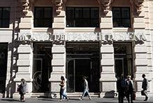 People walk past a bank in Rome, Italy: a weak economy is a strain on banks (photo: Gregorio Borgia/AP) 