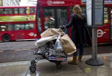 Shopper on Oxford Street in central London. Strength of U.K. recovery is driven in part by consumer spending (Photo: Justin Tallas/AFP/Getty Images/Newscom) 