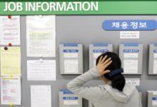Female jobseeker in employment office, Korea.  Women are more likely to remain in work if they have full-time jobs with benefits (photo: Corbis/Reuters/Truth Leem) 