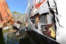 Repairs to a ship damaged by cyclone Pam.  Total reconstruction costs are estimated to add up to around 40 percent of GDP (photo: Corbis/EPA/David Hunt) 