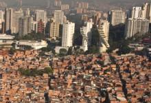 Low-income, upscale neighborhoods abut in Sao Paulo, Brazil: excessive income inequality drags down economic growth rate (photo: Danny Lehman/Corbis) 
