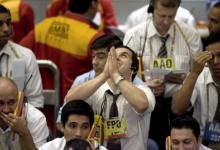 Traders on the floor of the Sao Paulo, Brazil stock exchange: risks to global financial stability are moving to emerging markets (photo: Sebastiao Moreira/epa/Corbis) 